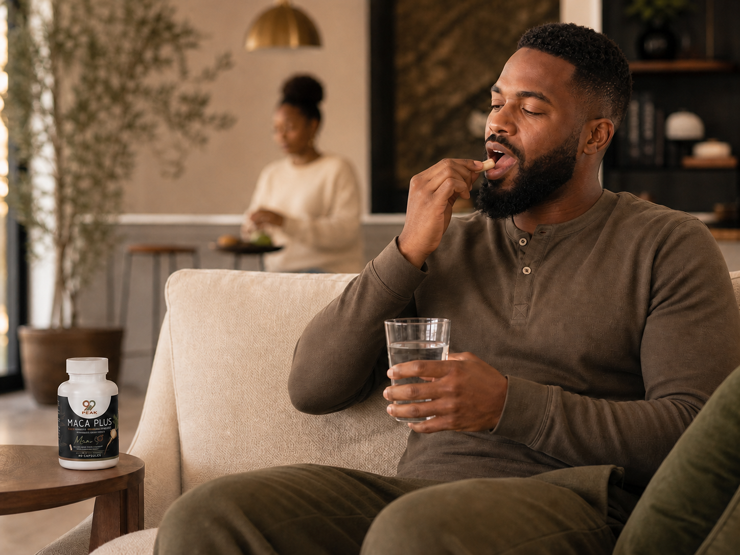 Man taking Maca Plus with water as part of his routine